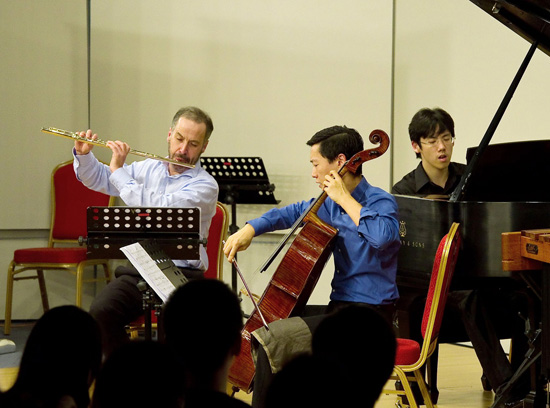 Adrian Spence, Trey Lee, and Haochen Zhang in performance.