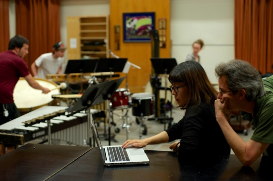 Christopher Adler working with composition fellow Young-jin Jeon.