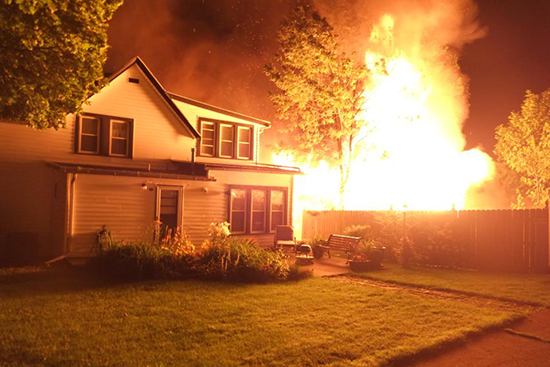 Burning house from backyard