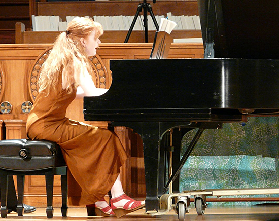 Sarah Cahill, using her forearm to play clusters in Henry Cowell’s High Color