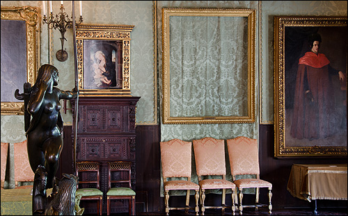An empty frame in the Dutch Room of the Gardner Museum