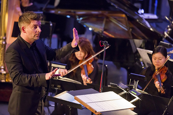 Matthias Pintscher conducting members of the New York Philharmonic in Contact! At the Biennial: Beyond Recall at Museum of Moder Art, 5/29/14. Photo by Chris Lee