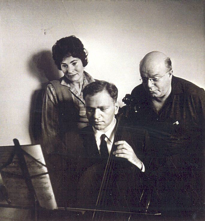 Barab playing cello with ben Weber standing in back
