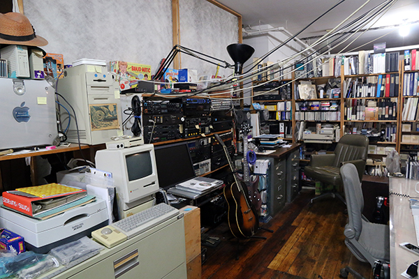 Computers, bookcases and wires scattered across Laurie Spiegel's loft