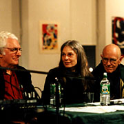 Robert Moog, Laurie Spiegel, and Max Matthews seated together at a table.