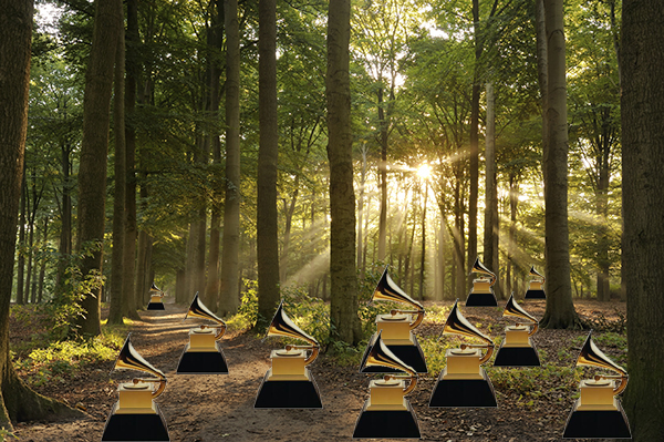 A photoshopped image of a bunch of Grammy awards in the middle of a forest