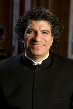 Giancarlo Guerrero standing and wearing a black shirt