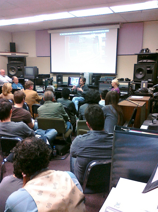 James Horner lecturing a group of students in a classroom.