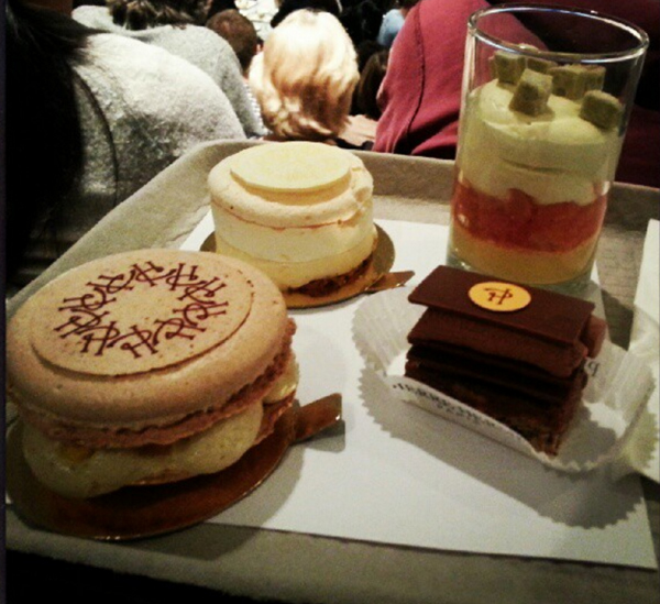 An assortment of desserts on a tray.
