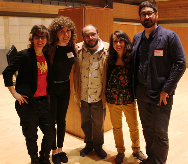 Claire Chase, Lainie Fefferman, Daniel Felsenfeld, Mary Kouyoumdjian, and Matt Marks standing together in an empty room.