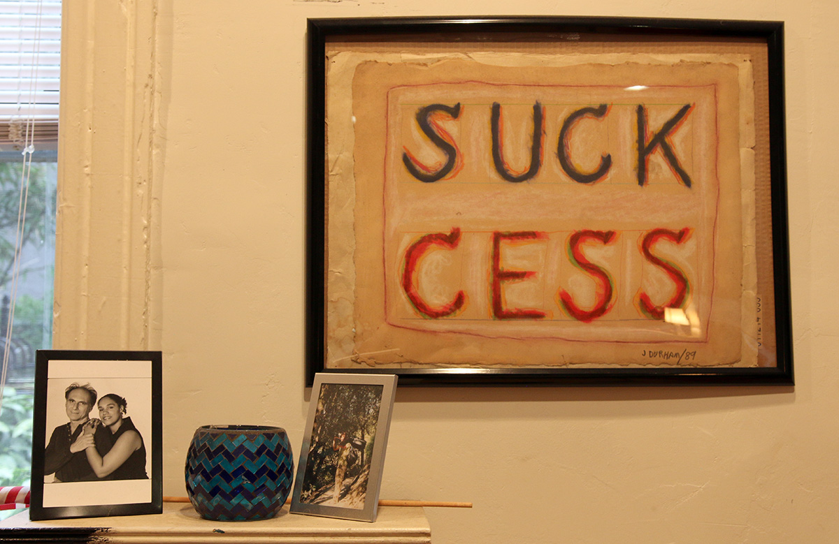 A text-based painting with the text: "SUCK CESS"