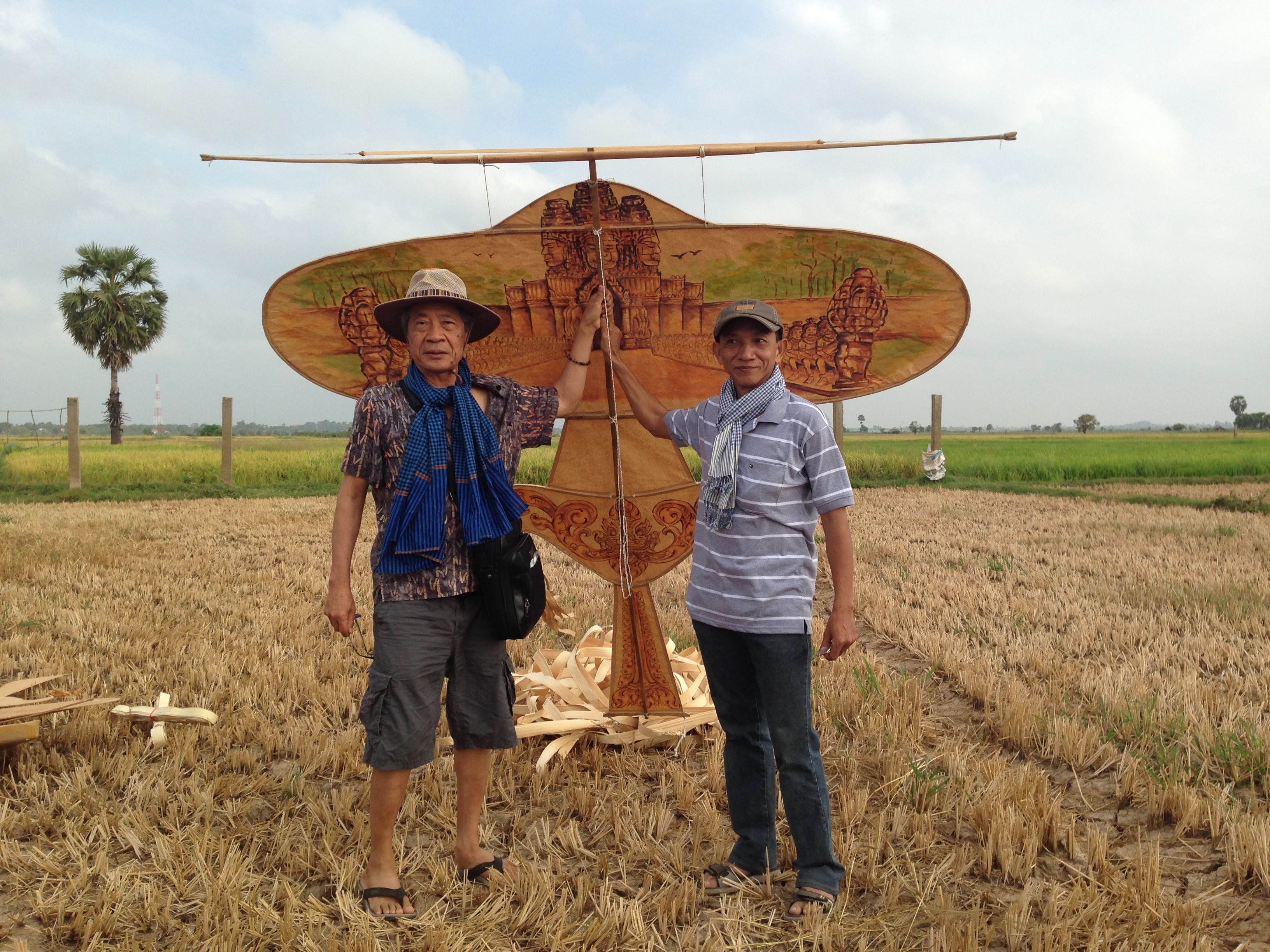 Chinary Ung and Yos Chandara with a Cambodian singing kite. 