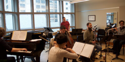 Eighth Blackbird fits in a rehearsal during their Curtis residency. From left to right: Lisa Kaplan, Yvonne Lam, Nick Photinos, Matthew Duvall, Michael Macceferri, and former member Tim Munro. 