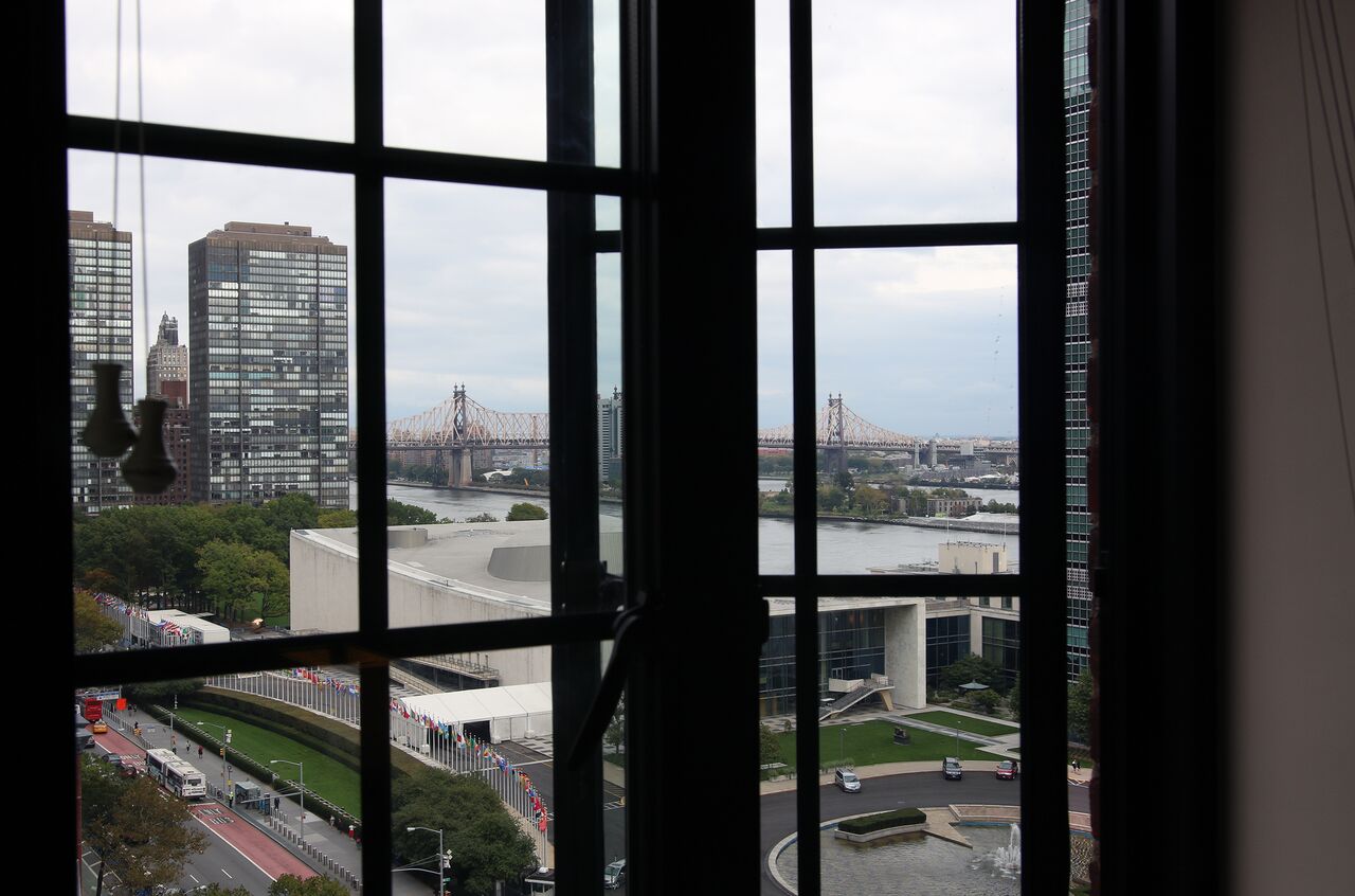 The view from the window of Torke's studio apartment showing the United Nations and the 59th Street Bridge. 