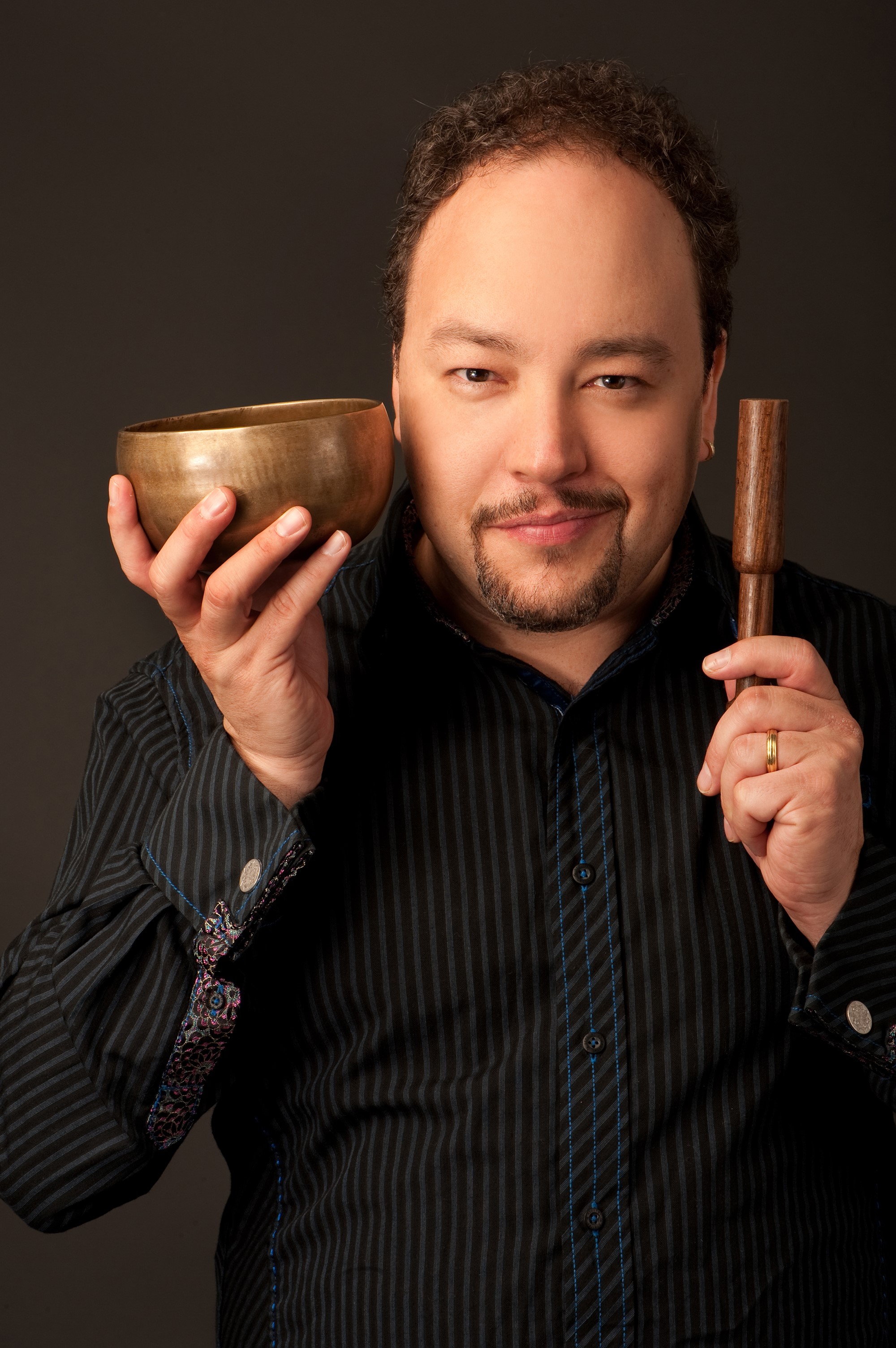 Robert Paterson holding a bowl and a mallet
