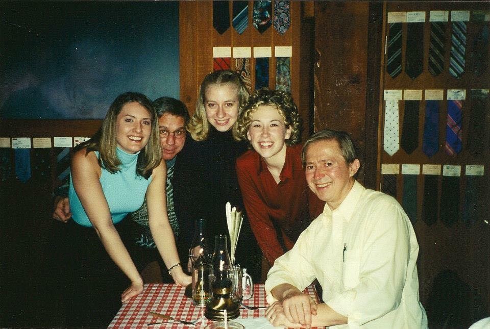 David Maslanka (far right) and Stephen K. Steele (center) with students: taken at a steak house during the Symphony No. 5 tour and CBDNA performance in Denton, TX, February 2001