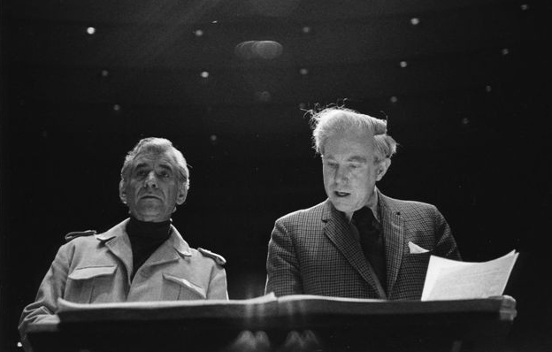 Leonard Bernstein and Elliott Carter looking over a score.