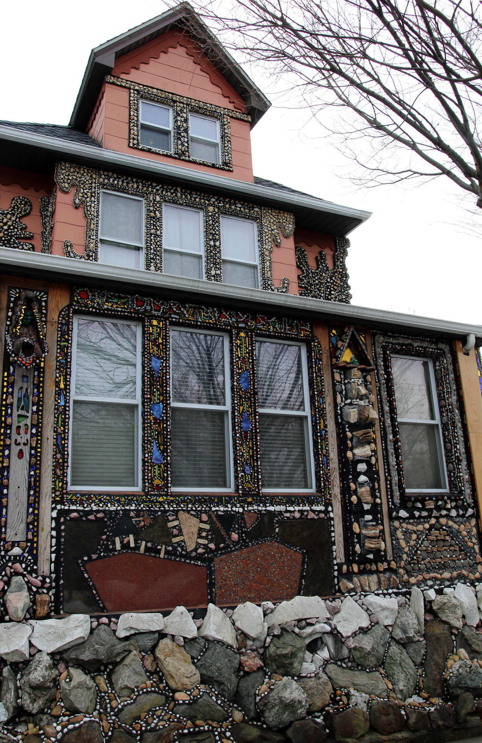 The elaborately ornamented exterior of Milford Graves's home.