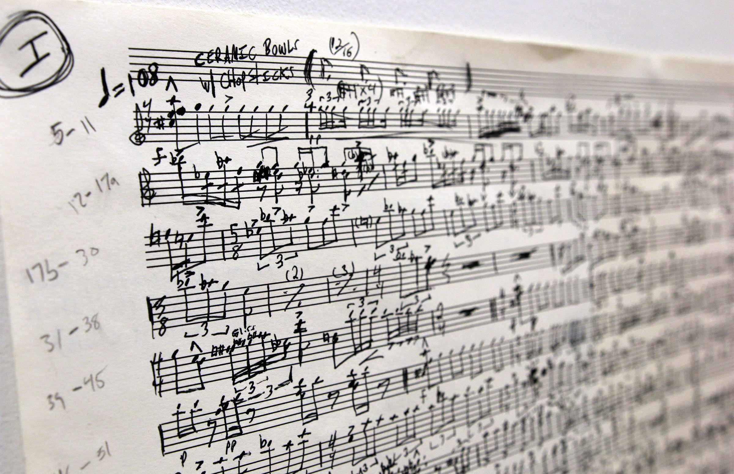 A page from a handwritten score by Andy Akiho.