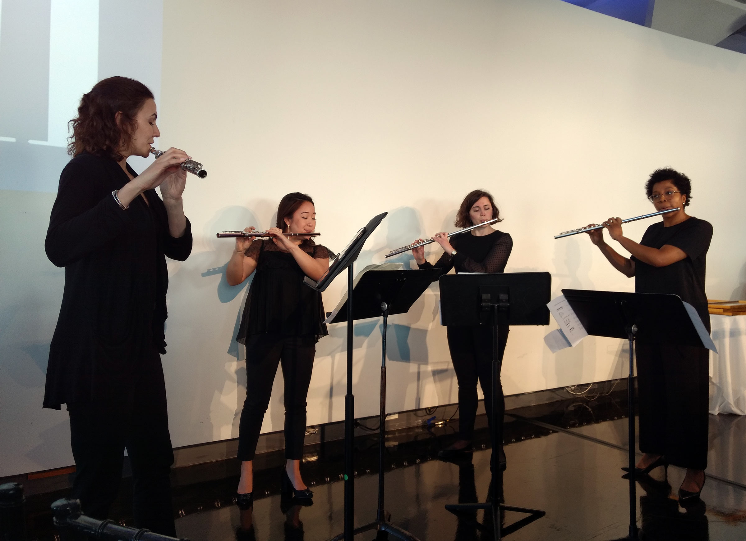 Flute quartet performance during the ceremony.