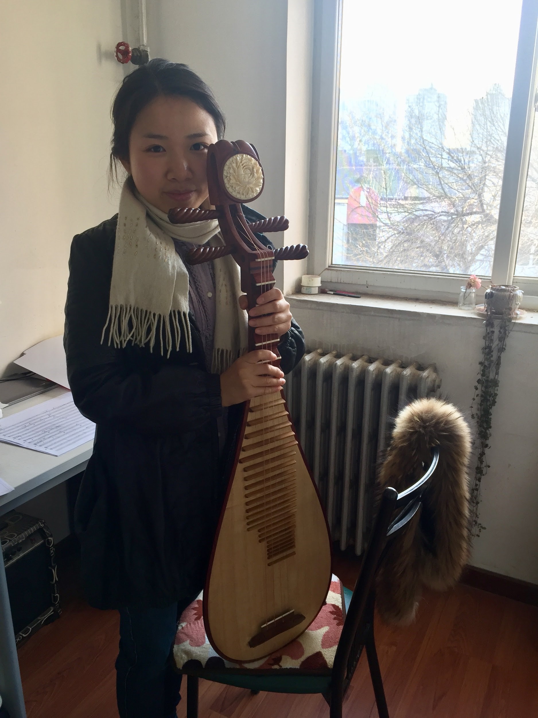 Xia Yuyan holding a pipa in March 2018. Photo by Rachel C. Walker.