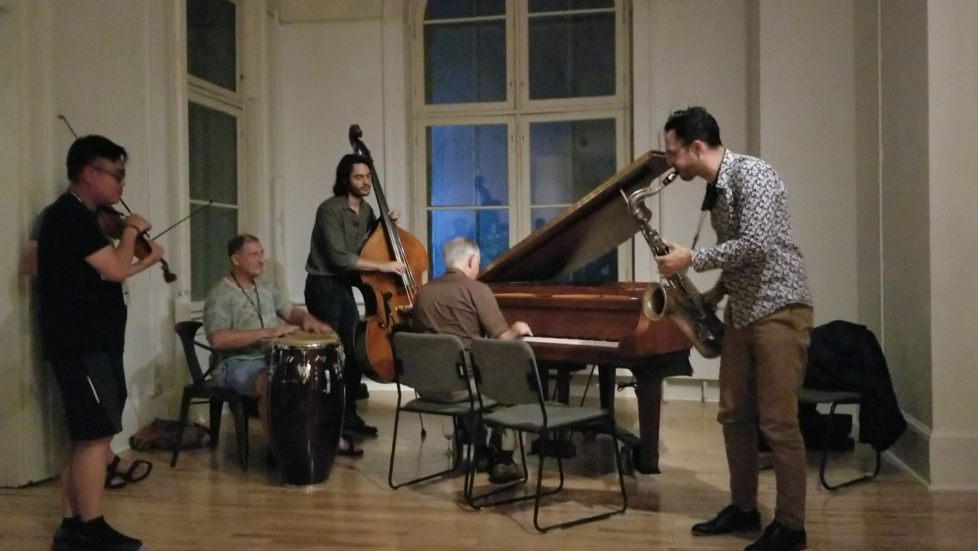 An impromptu jam session involving VCFA students and faculty (including Andy Jaffe at the piano) as well as visiting musicians (including violinist Fung Chern Hwei)