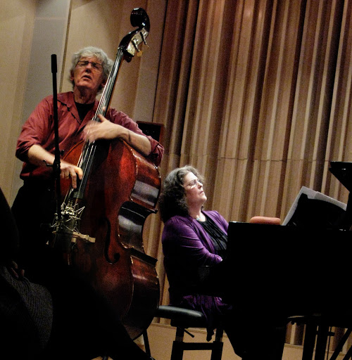 Mark Dresser playing double bass and Diane Moser playing piano