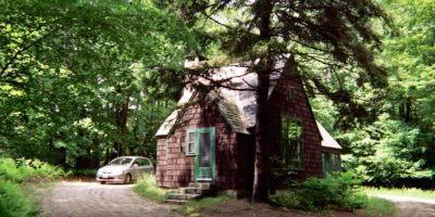 A car approaching one of the cabins at the MacDowell Colony in Pererborough, New Hampshire