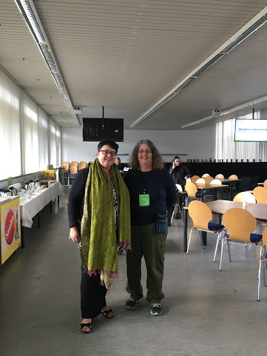 Prof. Sabine Breitsameter and Diane Moser standing together in a conference room.