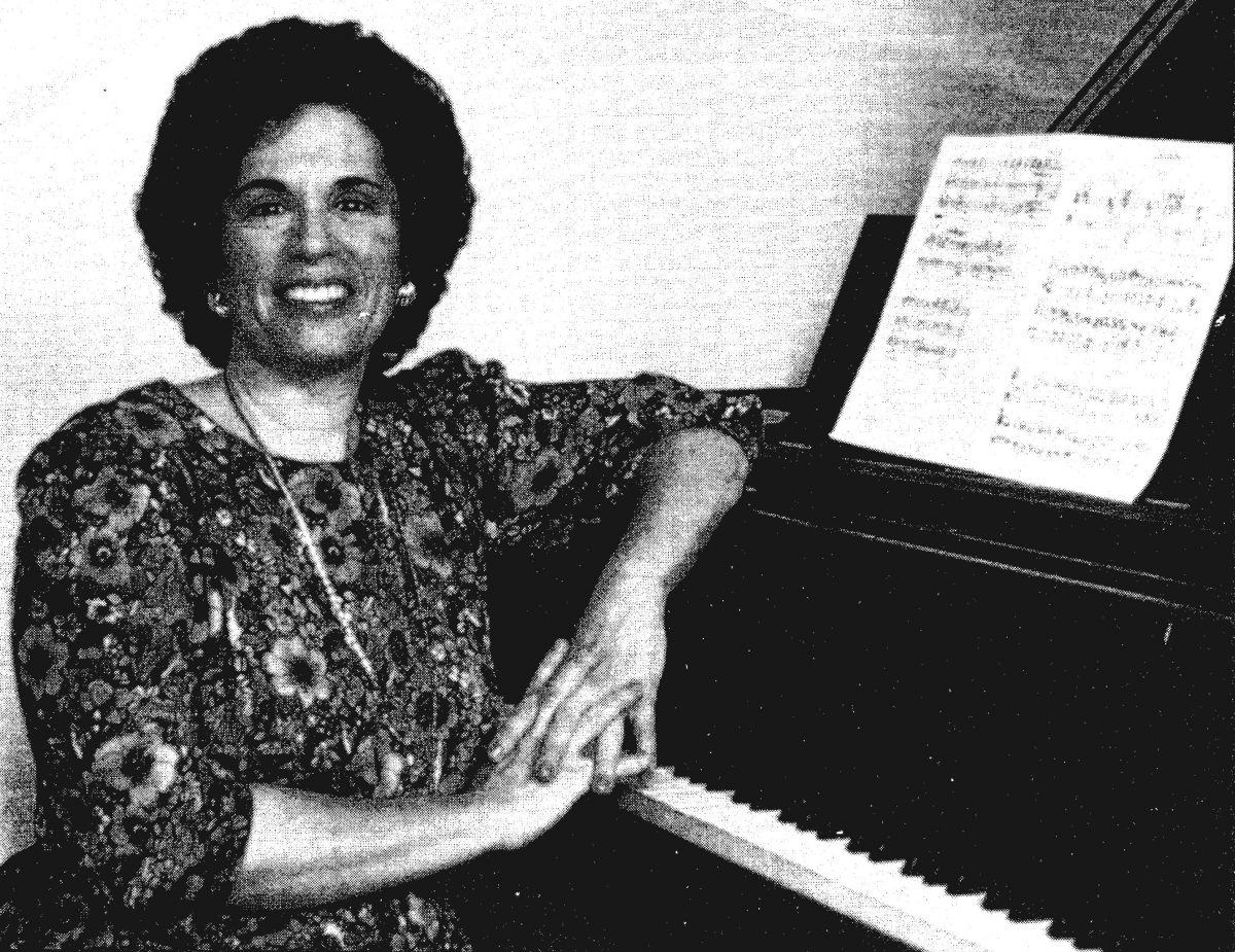 An early photo of Judith Lang Zaimont at the piano