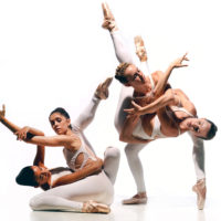 New Chamber Ballet; dancers posing together in white leotards