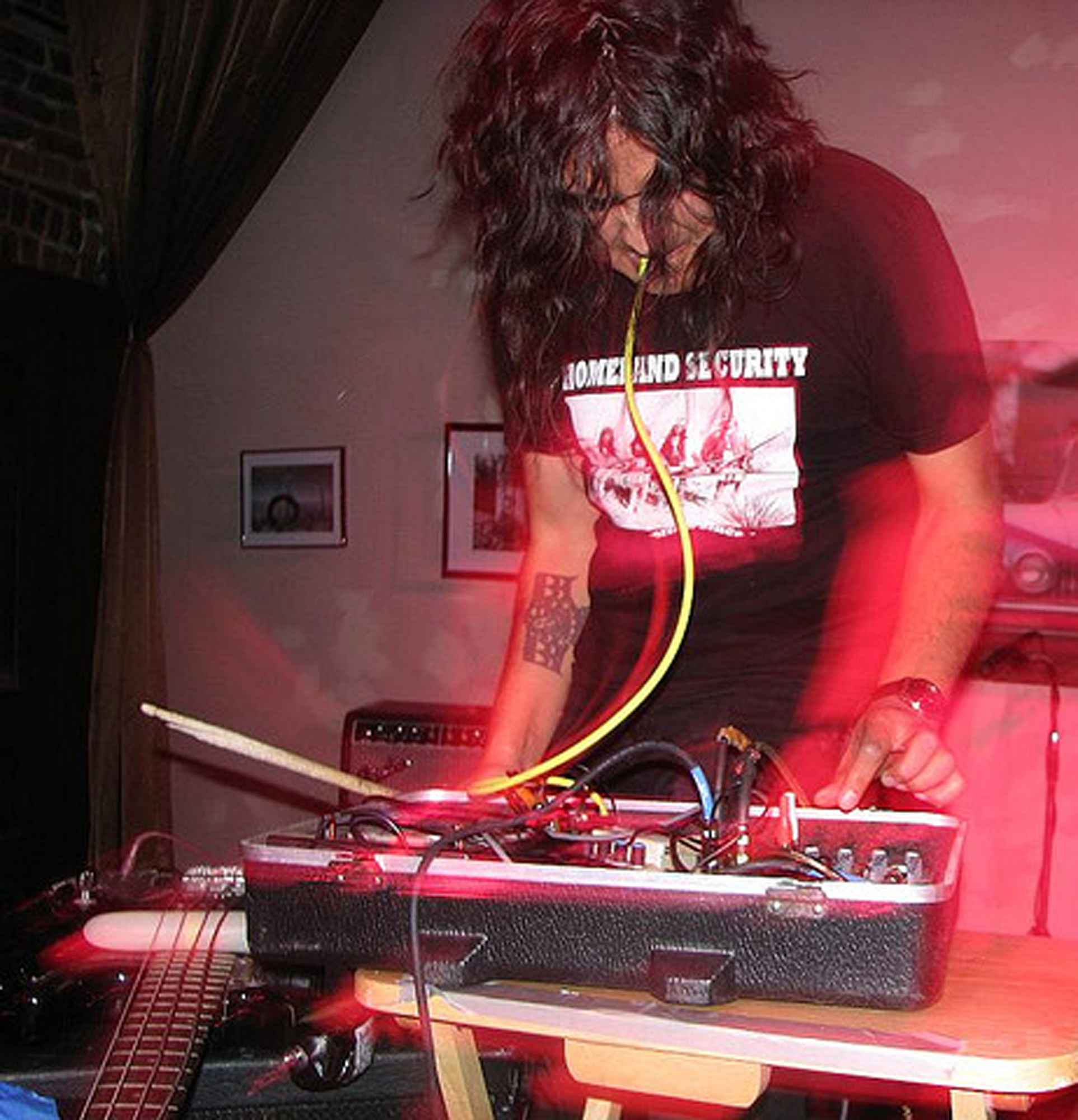 Raven Chacon performing on a synthesizer