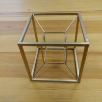 A three-dimensional rendering of a tesseract.