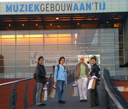 Composers on their way to the first concert of Gaudeamus Week at the Muziekgebouw